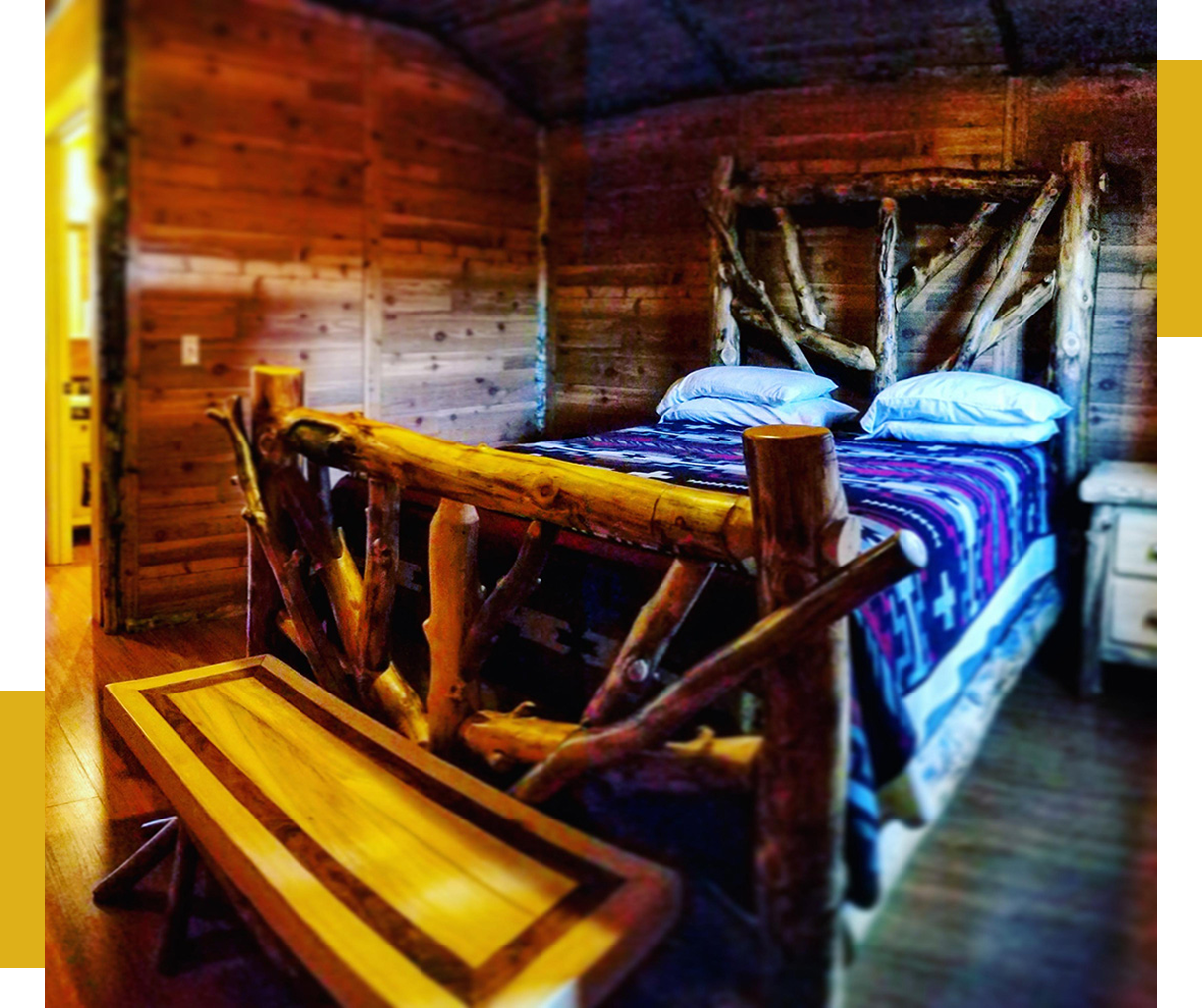 Group 2 (1) Rustic bedroom with log bed and bench.
